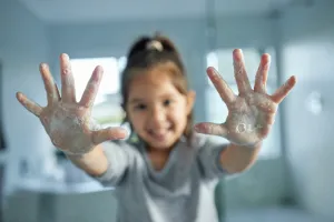 Hispanic Girl Washing Hands